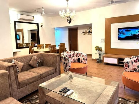 Apartment, Balcony, City View | Living area | 42-inch Smart TV with digital channels