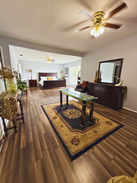 Open-concept layout connecting living, dining, and kitchen areas