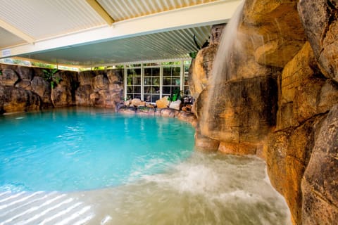 Indoor pool, outdoor pool, pool umbrellas, sun loungers