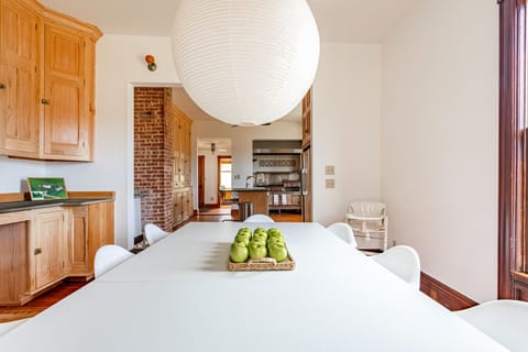 Beautiful dining area with direct access to kitchen, perfect for family dinners
