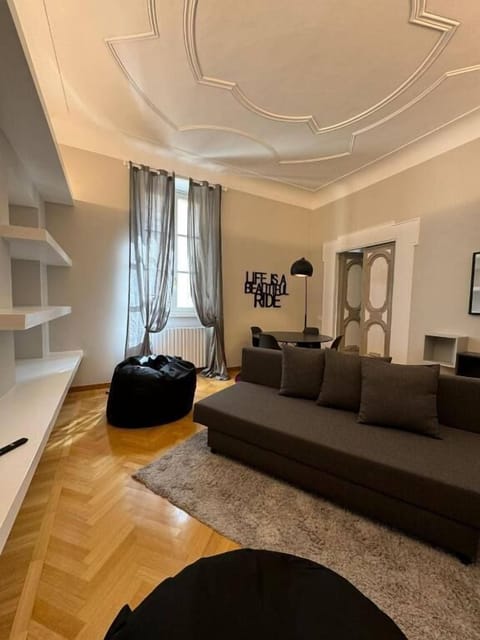 Apartment, City View | Living area | Flat-screen TV