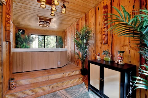 Relax and unwind in the private indoor hot tub area, perfect for a relaxing evening. A peaceful and inviting space to enjoy quiet moments after a day of exploring.