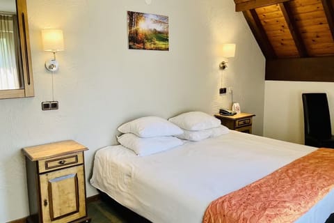 Sink into a plush double bed for a restful night.