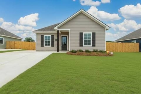 Welcome to your spacious family retreat! Enjoy sunny days in the private, fenced yard, perfect for kids to play. This cozy home offers comfort and convenience for your next getaway.