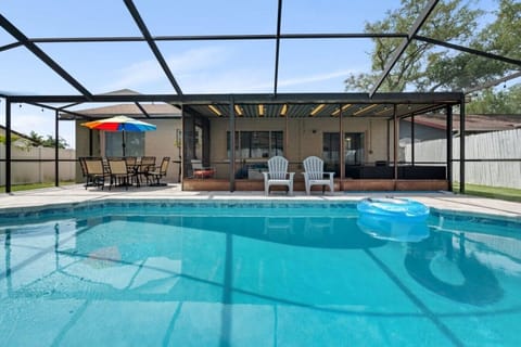 Pool Area | Private Screened Pool & Sun Loungers | Spacious Deck Area