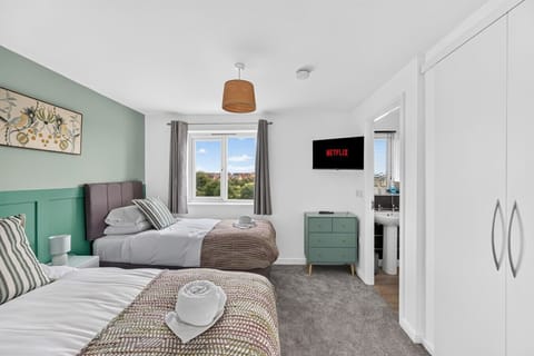 Bedroom one features a private en-suite shower.