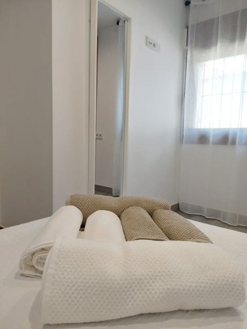 Family Quadruple Room, Kitchen A | Laptop workspace, blackout drapes, soundproofing, iron/ironing board