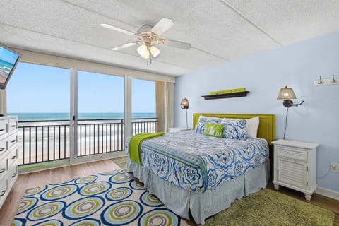 Wake up to stunning ocean views in this bright beachfront bedroom. This relaxing beach stay features direct balcony access, cozy coastal décor, and the perfect space to unwind while listening to the waves.