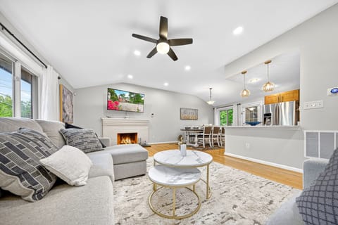 Bright, spacious living room with comfy seating for the whole group.