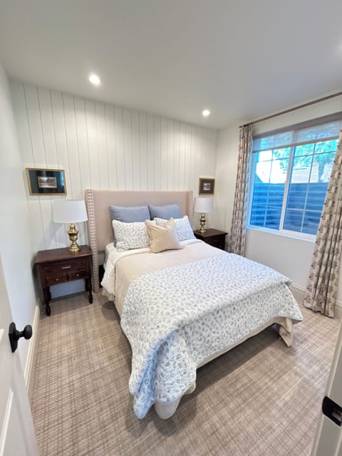 Full size bed with luxury bedding