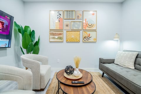 Relax in the cozy boho-style living room, featuring warm tones, textured accents, and a tranquil vibe