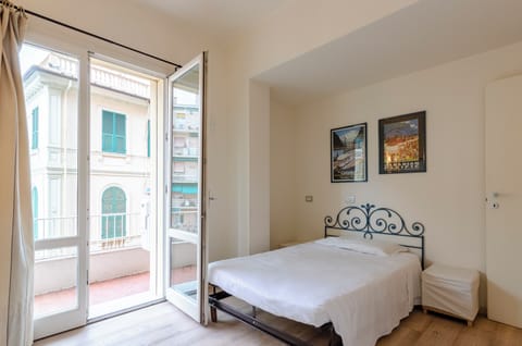 Family Apartment, 6 Bedrooms, Balcony, Mountain View | Laptop workspace, iron/ironing board, free WiFi, bed sheets