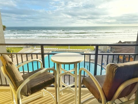 Unwind with panoramic ocean views right from your balcony. 