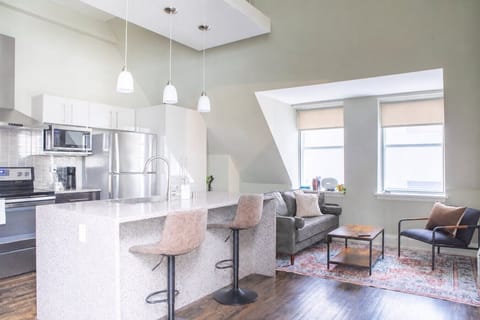 Make yourself at home. Whether you`re catching up on work at the bar or lounging on the sofa, this space is designed for comfort
