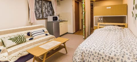 Family Apartment, Non Smoking, City View (1F) | Desk, blackout drapes, iron/ironing board, free WiFi