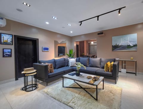 Economy Apartment, Balcony, City View | Living area | Flat-screen TV
