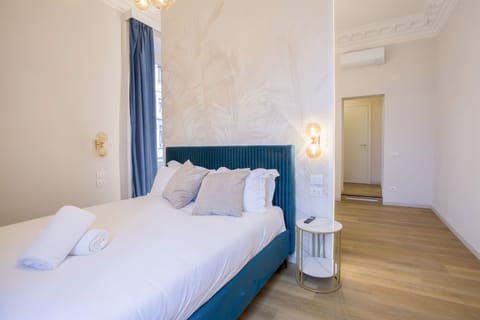 Luxury Quadruple Room, City View | Minibar, in-room safe, desk, blackout drapes