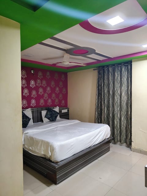 Deluxe Double Room, City View | In-room safe, desk, laptop workspace, iron/ironing board
