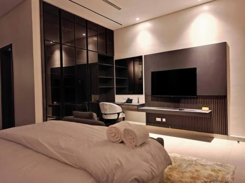 Deluxe Apartment, Balcony, City View | In-room safe, desk, laptop workspace, blackout drapes