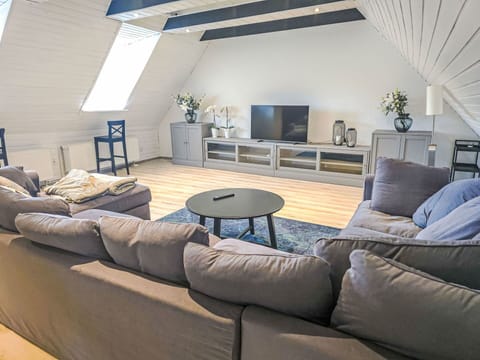 Furniture, Interior Design, Flooring, Wood, Floor, Couch, Ceiling, Living Room, Lighting, Room