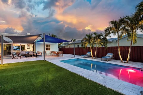 Don’t let the sunset stop the fun in the back yard oasis!​