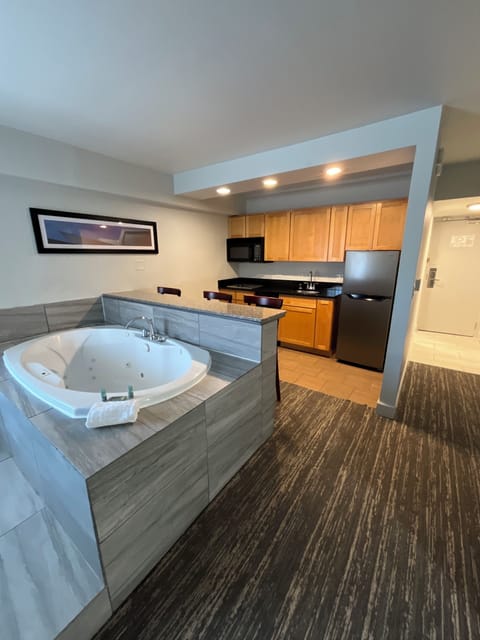 Suite, 2 Queen Beds, Non Smoking, Kitchenette | In-room safe, desk, laptop workspace, iron/ironing board