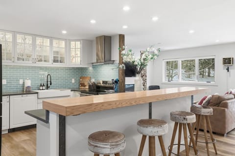 Stylish, fully equipped kitchen with bar seating