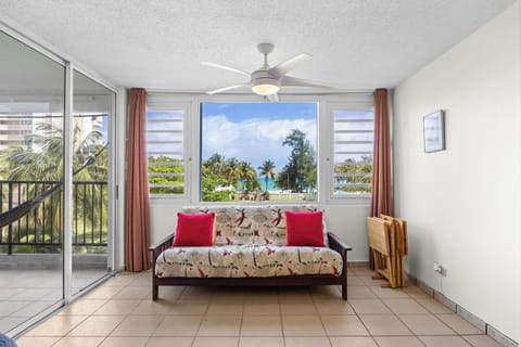 Apartment, Balcony, Pool View | Living area | 32-inch flat-screen TV with digital channels