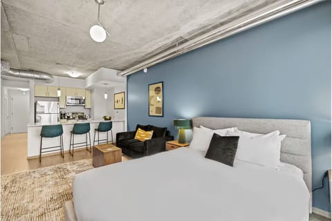 Settle into an airy studio with bed, sofa, and kitchen.