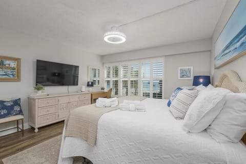 Bright and airy bedroom with coastal-inspired decor and natural light