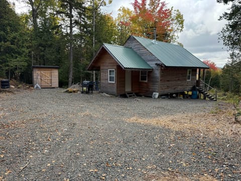 Back view of cabin & parking lot