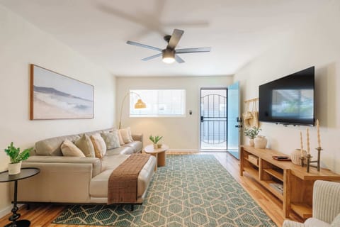 Spacious lounge with a large smart TV. Perfect after a beach day