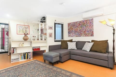 Stylish studio with corner nook Queen Bed and open living and dining area