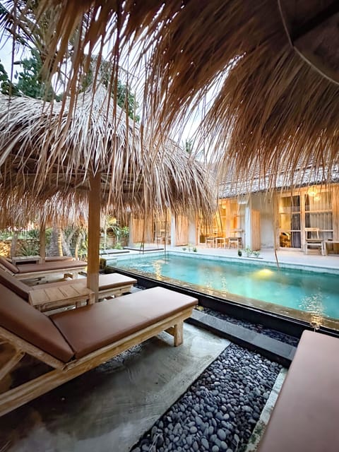 Outdoor pool, pool umbrellas, sun loungers