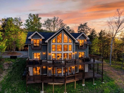 Stunning multi-level mountain lodge nestled in the lush greenery of the Smoky Mountains!