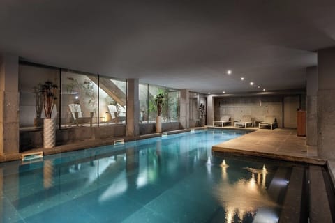 Indoor pool, seasonal outdoor pool, pool umbrellas, sun loungers