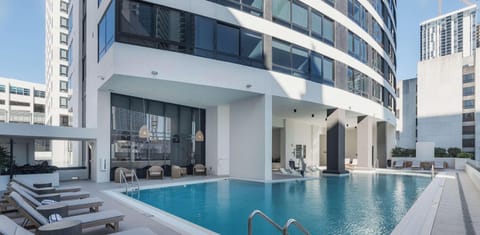 Rooftop pool with Miami skyline views — your urban oasis awaits
