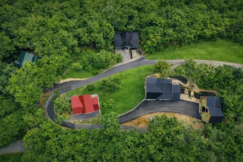 Luxury 5-cabin mountain retreat designed as one private estate for unforgettable group stays near Gatlinburg.
