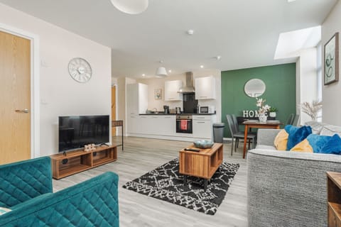 Looking across the living room to the kitchen and dining area
