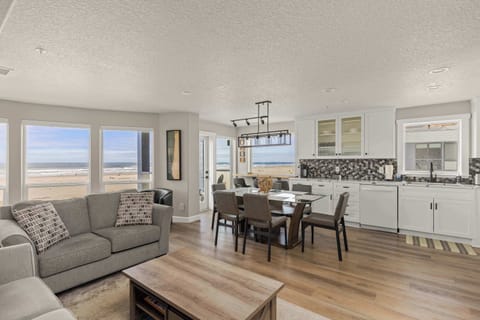 Oceanview condo with open living, modern kitchen & dining—perfect for relaxing coastal getaways.