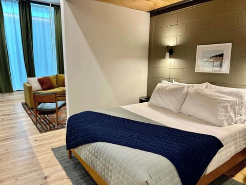 Queen bed with luxury linens and a plush memory-foam mattress for a restful night's sleep
