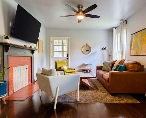 Sink into the mid-century inspired living room after a day exploring Birmingham or working remotely.