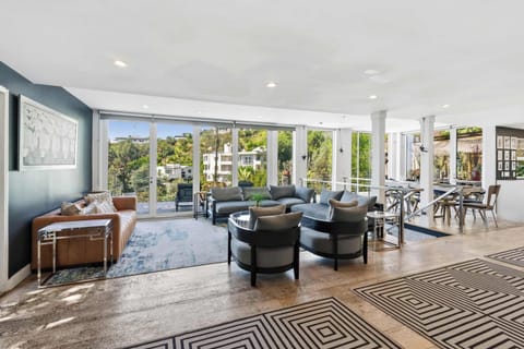 Open-Plan Living, Dining & Terrace with Panoramic Hillside Views