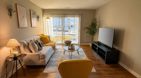 Open-plan living and dining area with smart TV