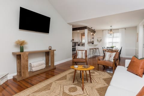 Living Room w/Smart TV, Sofa, & Chairs