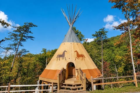 Beautiful sunset view of the luxury teepee exterior.