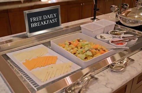 Buffet selection of fruits and cheeses to start your day.
