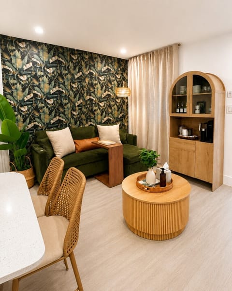 Spacious living room with comfortable seating and boutique Cuban-inspired décor.