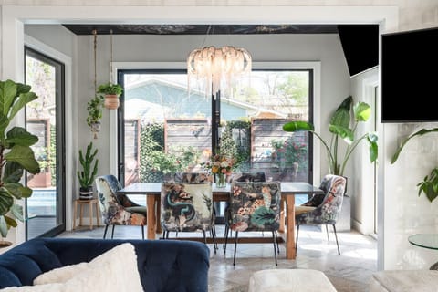 Chic art deco dining room perfect for gatherings with seating for up to six guests.