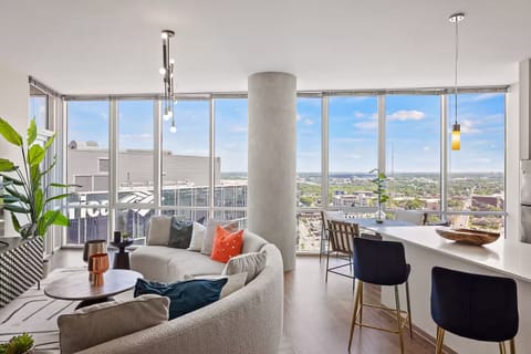 Sip coffee by the windows and watch the city glow.